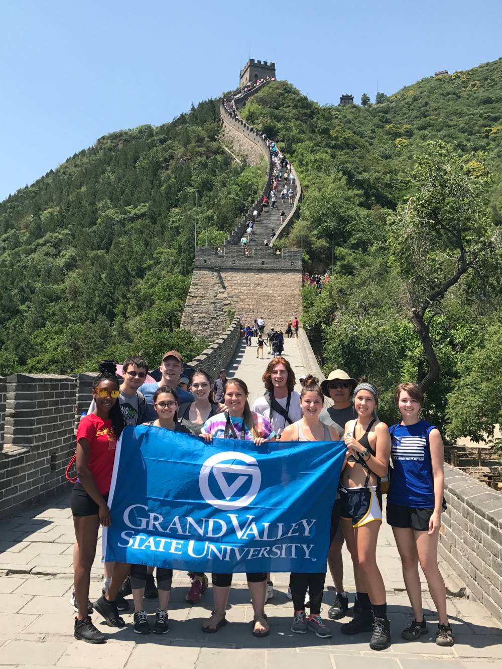 Group photo with flag at Great Wall